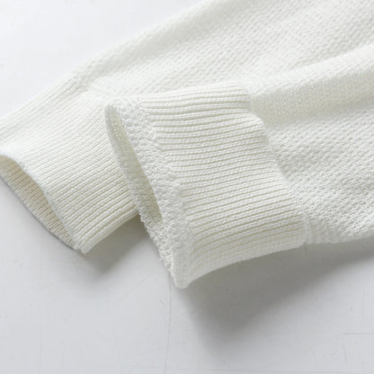 Élise Blanche™ – Cardigan en Coton Pur pour Enfants
Timeless softness. Quiet elegance.