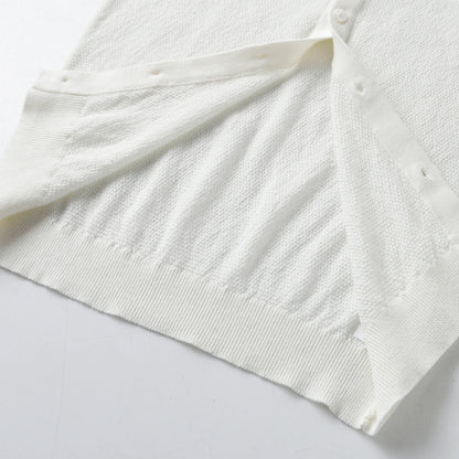 Élise Blanche™ – Cardigan en Coton Pur pour Enfants
Timeless softness. Quiet elegance.