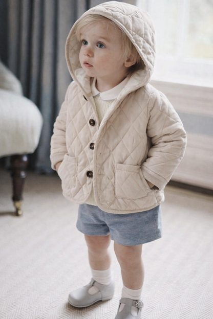 Émile d’Hiver
Manteau matelassé en coton pour bébé garçon